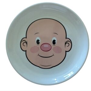 Fred plays with his food plate ceramic